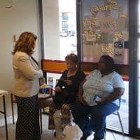 Customers sitting at our office 25th anniversary party in Tampa FL