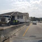 Truck hauling house in Myrtle Beach SC got stuck  on Sea Mountain Hwy